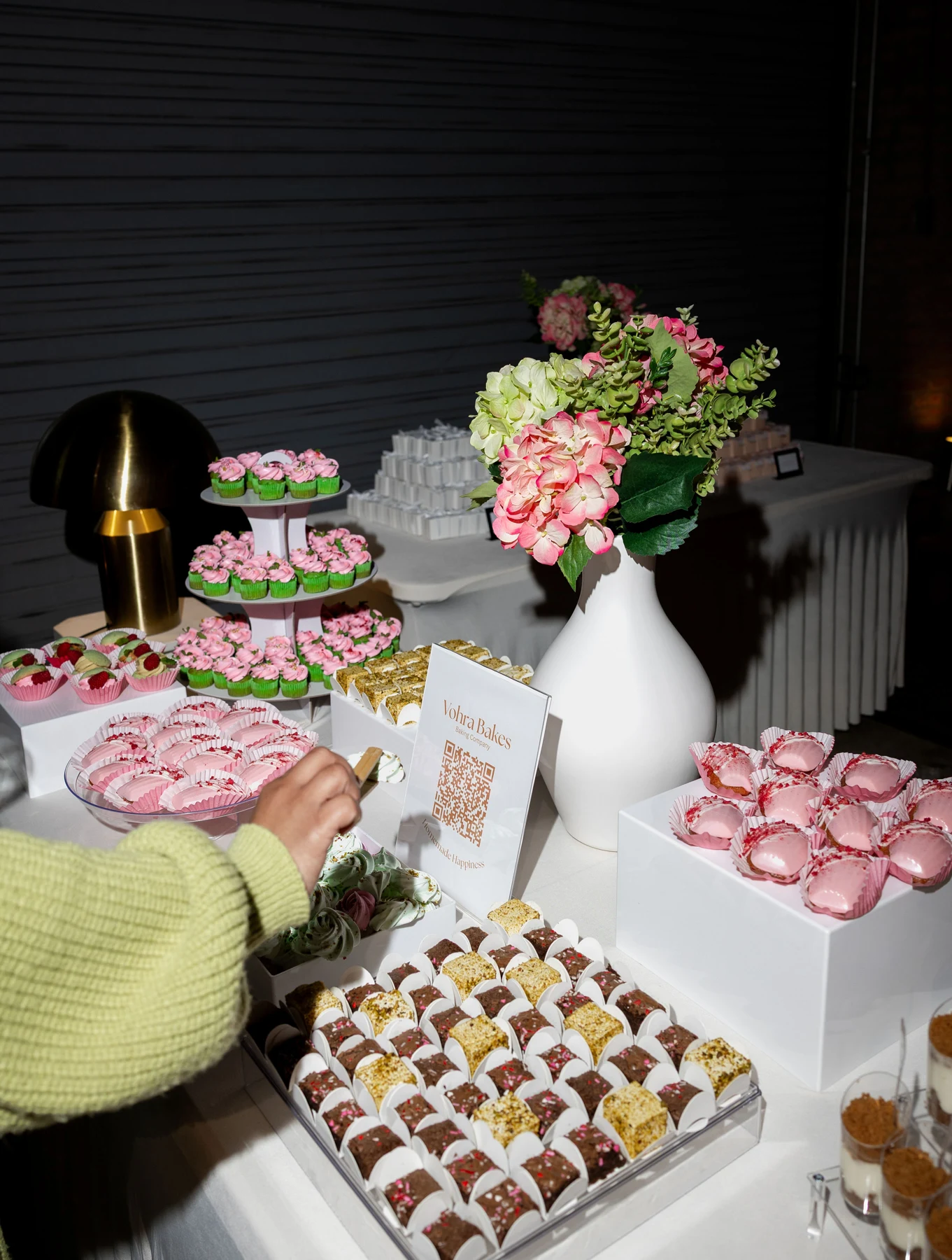 Flowers and desserts arranged for conference guests