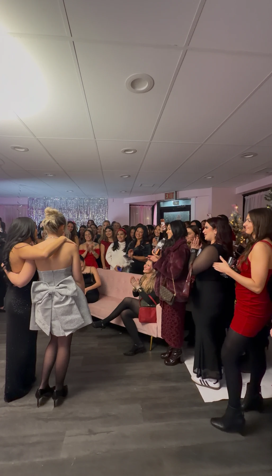 A shared moment during the Christmas networking party