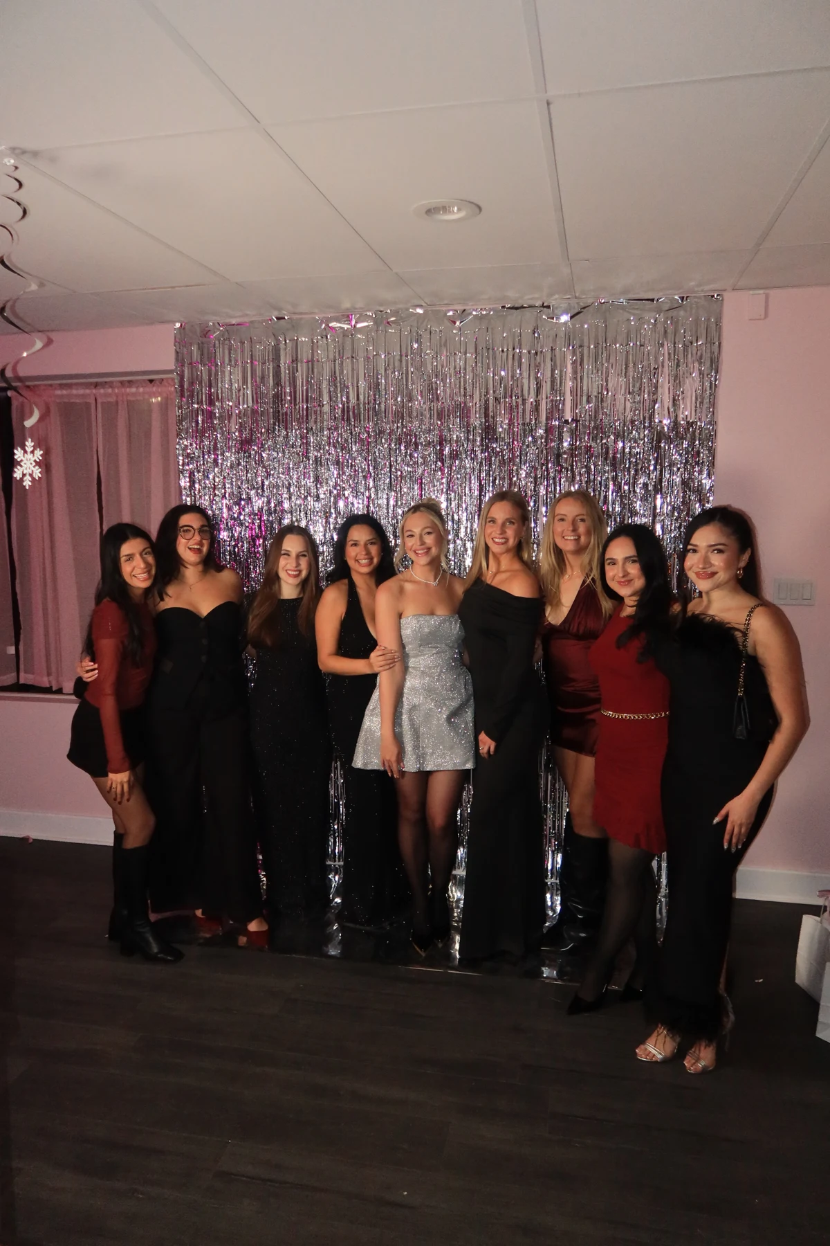 Christmas party guests posing together